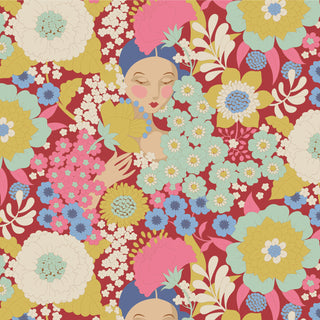 Tilda Wallflower by 15-Brewer features an illustration of a woman with closed eyes, blue beads, a pink flower in her hair, and a yellow fan, surrounded by colorful florals on red. Sold by the yard.