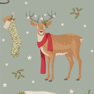 Charming illustration of a reindeer with holly and a red scarf beside a Christmas stocking and mistletoe on green, from Tilda Merry Little Christmas 100630 Winterfriends Duckegg Fabric by Fabric by Tilda—ideal for vintage fabric lovers.
