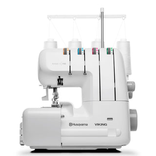 A white Husqvarna Viking Amber S100 Overlock Machine with four thread spools and color-coded guides, shown in profile view on a white background.
