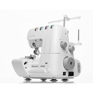 A white Husqvarna Viking Amber S100 Overlock Machine from Husqvarna Viking, featuring multiple thread guides, control dials, and 16 built-in stitches, is displayed against a plain white background.