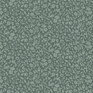 Tilda Merry Little Christmas 110142 Blender Eve Petrol Fabric by Tilda features a seamless pattern of small, light green floral and leaf motifs on a dark green background, reminiscent of vintage Tilda Fabrics charm.