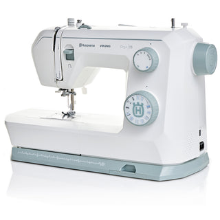The Husqvarna Viking Onyx 15 by 38-SVP - Singer Viking Pfaff, in white and light gray, features user-friendly dials and a built-in measurement guide—ideal for beginners starting their sewing journey.
