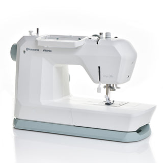 A white Husqvarna Viking Onyx 15 sewing machine by 38-SVP - Singer Viking Pfaff is shown from the side against a white background.