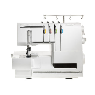 The Husqvarna Viking Huskylock S21 overlock machine features four thread holders, multiple tension dials, and a labeled measurement guide on the base, shown on a plain white background.