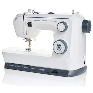 The Husqvarna Viking Onyx 25 by 38-SVP - Singer Viking Pfaff is a white sewing machine featuring adjustment dials, a built-in measuring guide, and an automatic one-step buttonhole for easy garment creation.