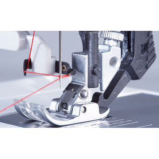 Close-up of a PFAFF Select 4.2 sewing machine needle, presser foot, and red thread, highlighting detailed threading and mechanical parts with the PFAFF Integrated Dual Feed system.