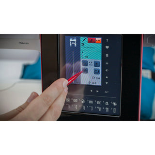 A hand uses a stylus to choose exclusive stitching techniques on the digital touchscreen of the 38-SVP - Singer Viking Pfaff Husqvarna Brilliance 75Q sewing machine.
