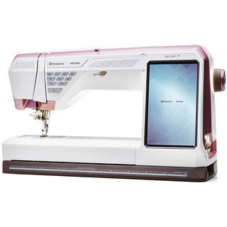 The Husqvarna Viking Epic Quilt 97 with Quilting Kit by Imagine Sewing & Vacuum is a white and pink sewing machine featuring a large touchscreen display and multiple control buttons.
