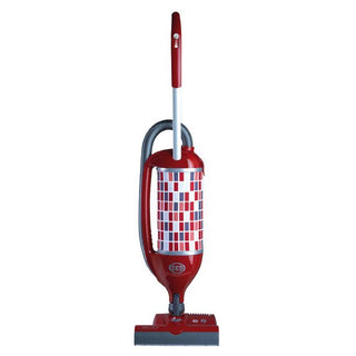 The Sew & Vac Sebo Felix Premium is a red upright vacuum with a geometric red and white patterned body and an S-class filtration system, displayed standing on a white background.
