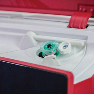 Close-up of the Husqvarna Brilliance 75Q by 38-SVP - Singer Viking Pfaff, showing a compartment with green and white bobbins, vibrant red and white body design, and showcasing unique stitching techniques.