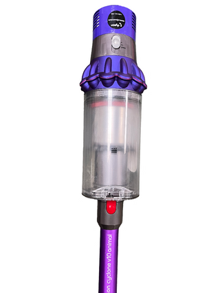 A Sew & Vac Dyson Cyclone v10 Animal cordless vacuum cleaner featuring a purple body, a transparent dustbin, and a red power button. The model name "Cyclone v10 Animal" is displayed near the base. This demo vacuum is in like-new condition, perfect for quick and efficient cleaning.