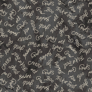 Robin Kingsley Spooky Stitches MAS10876-J Spooky Words Black Fabric by 47-EE Schenck features a black background with handwritten Halloween words like "Boo," "Ghosts," and "Spooky" scattered throughout—perfect for festive Halloween projects.