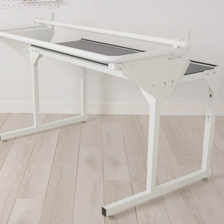 A Husqvarna Viking Platinum Q165 Moveable Quilter W/ 5' Frame with a metal frame on it.