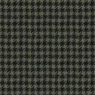 A close-up of the Snowy Days & Frosty Nights by Kathi Campbell: Houndstooth Green/Black 8461-60 fabric from 47-EE Schenck, ideal for winter projects or quilting cotton designs.
