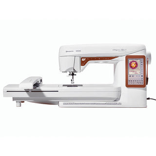 A white and brown Husqvarna Viking sewing machine on a white background.