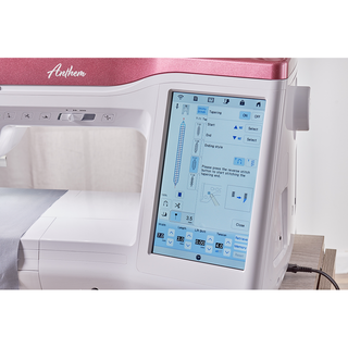 Close-up of the 37-Baby Lock Anthem Quilting & Sewing Machine featuring a digital touchscreen display with built-in stitches and settings, and a piece of fabric placed under the sewing area.