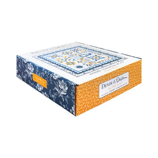 A rectangular box labeled "Denim Halloween Figs Quilt Kit Featuring Denim & Daisies by Fig Tree Quilts" from 1000-Education, showcasing quilt and floral designs, perfect for completing your next cozy quilt top.