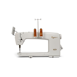 Commercial-grade Baby Lock 20" Regalia Stationary Machine with Table And Insert, with dual thread spools and an attached control panel, isolated on a white background.