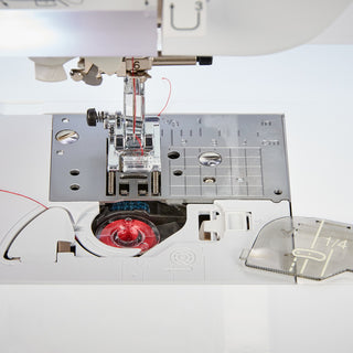 A Baby Lock Altair Sewing & Embroidery Machine with a needle attached to it.