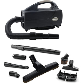 Introducing the Oreck Compact Canister BB1200DB in sleek black—this portable handheld vacuum cleaner showcases a hose and an array of attachments, including brushes and nozzles, for versatile use. Its advanced HEPA filtration ensures a thorough clean by effortlessly capturing fine dust particles.