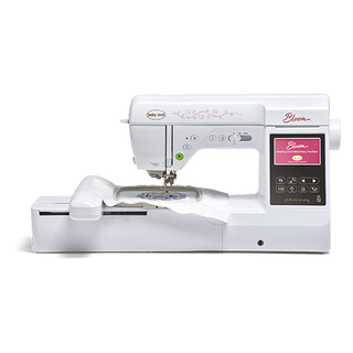A Baby Lock Bloom Sewing and Embroidery Machine from Baby Lock, featuring a white exterior with floral designs, a touchscreen display, an attached embroidery hoop, and built-in designs.