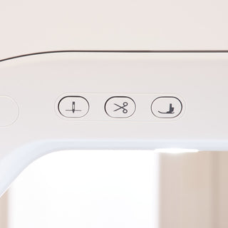 A close up of the buttons on a Baby Lock Vesta Sewing & Embroidery Machine.