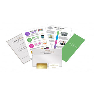 The Baby Lock Love of Sewing Membership Level 1 includes flyers, a history sheet, a green booklet, and a white envelope containing a gold membership card for access to exclusive sewing videos.