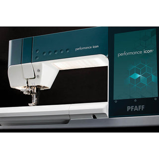 Close-up of the PFAFF Performance Icon sewing machine, highlighting its touchscreen display and the brand’s largest working area—ideal for handling large sewing projects effortlessly.