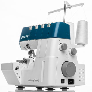 The PFAFF Pfaff Admire 1000, a white and blue overlock machine with four thread spools, control knobs, and differential feed, is displayed against a plain background.