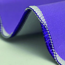 A close up of a Baby Lock Acclaim Serger fabric.