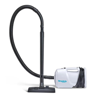 A Simplicity S100 Sport Portable Canister Vacuum with a hose attached to it.