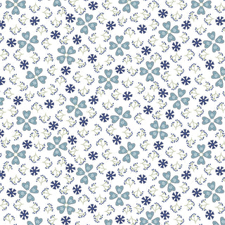Seamless pattern featuring blue five-petal flowers, dark blue six-pointed star shapes, and small sprigs with tiny buds on a white background. The design is evenly spaced and repetitive.