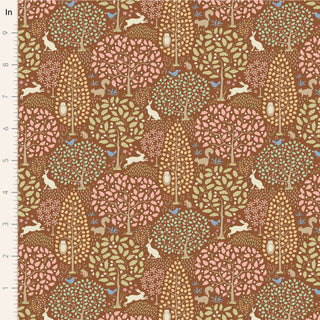 The Tilda Sanctuary CARAMEL TIL100567 Fabric by Tilda features green, red, pink, and blue trees with scattered rabbits and birds plus a vertical inch ruler for scale. Premium cotton; sold by the yard.