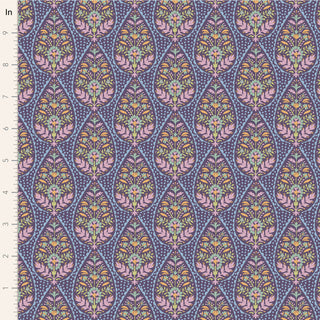 Tilda Sanctuary ADINA EGGPLANT TIL110571 by Fabric by Tilda features a repeating pink, purple, and green floral teardrop pattern on blue premium cotton, sold by the yard. Ruler along left edge shows scale.