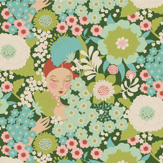 Whimsical illustration of a red-haired woman amid vibrant floral prints and green leaves in a seamless pattern—ideal for Tilda Wallflower Green TIL100605 Fabric Yardage by Fabric by Tilda.