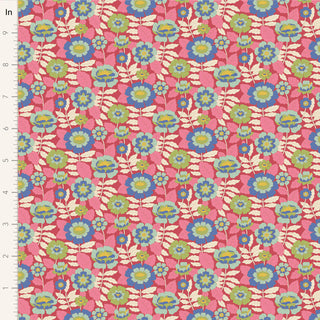 Tilda Wallflower Beverly Pink TIL100610 Fabric by Tilda features blue, green, and cream flowers on pink cotton; a ruler shows inches on the left edge. Inspired by the signature style of Tilda Fabrics.