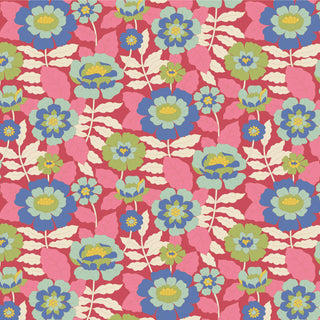Tilda Wallflower Beverly Pink TIL100610 Fabric by Tilda features a seamless, symmetrical floral pattern with blue, green, and yellow flowers on a pink background. Crafted from 100% cotton, it's perfect for classic floral projects.