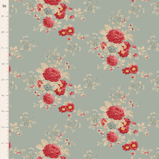 The Tilda Merry Little Christmas 100627 Carol Duckegg Fabric by Tilda features red, yellow, and blue flowers on a light green background with an inch ruler shown. Perfect for collectors or holiday projects.
