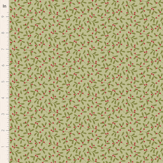 Tilda Merry Little Christmas 100633 Mistletoe Pistachio Fabric by Tilda features a green vintage print with small red berries and green leaves, shown with a ruler for scale—ideal for projects needing festive charm.