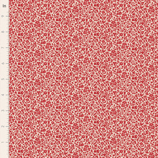 Tilda Merry Little Christmas 110138 Blender Eve Red Fabric by Fabric by Tilda features a red floral pattern with small leaves and flowers on cream, shown next to an inch ruler—perfect for vintage or Merry Little Christmas projects.