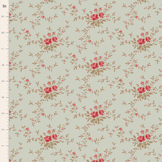 The Tilda Merry Little Christmas 110143 Blender Noel Mist Fabric by Tilda features clusters of red and pink roses with green leaves on a light beige background, styled like vintage holiday fabric; ruler shown for scale.
