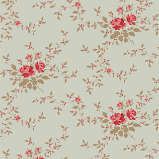 Tilda Merry Little Christmas 110143 Blender Noel Mist Fabric by Tilda features clusters of red and pink roses, brown leaves, and small red buds on light beige—ideal for vintage Christmas projects and Tilda Fabrics fans.