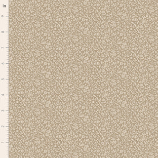 Tilda Merry Little Christmas 110148 Blender Eve Clay Fabric by Fabric by Tilda, a beige vintage fabric with a small white floral pattern, is shown next to an inch ruler for scale on the left.