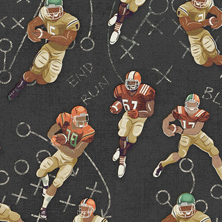 1683412B 16834-12 Football Players Black/Multi Skyline Studio TOUCHDOWN Fabric Yardage featuring football players in various uniforms over a dark background with white chalk-style play diagrams and “END RUN.”
