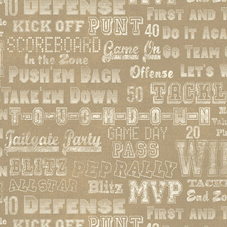 1684071B 16840-71 Cheer Em On Medium Tan Skyline Studio TOUCHDOWN fabric yardage featuring a repeating pattern of white American football-themed phrases like “TOUCHDOWN,” “GAME DAY,” and “DEFENSE.”