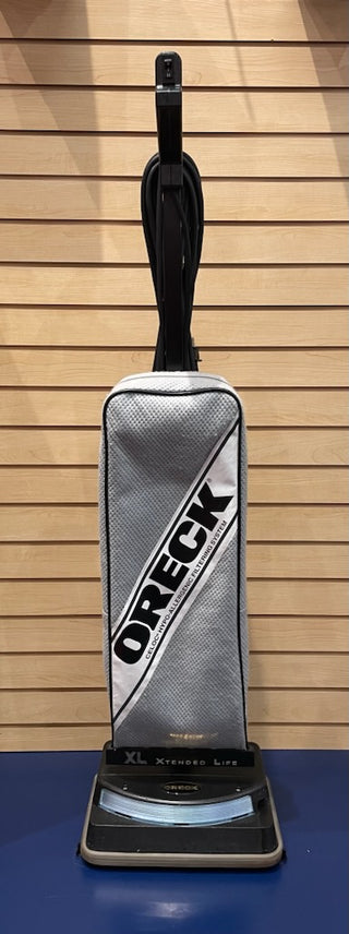 A new Oreck XL 2 Speed bag with a Sew & Vac logo on it sitting on top of a table.