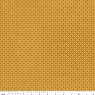 Bountiful by Sandy Gervais for Riley Blake (56-Riley Blake C17867-GOLD GEOMETRIC GOLD) quilting cotton fabric features a repeating geometric circle pattern in gold; a ruler at the bottom displays measurements in inches from 0 to 12.