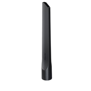 A black 2-Miele SFD 10 Long Crevice Tool (300 mm) vacuum accessory is standing upright against a plain white background.