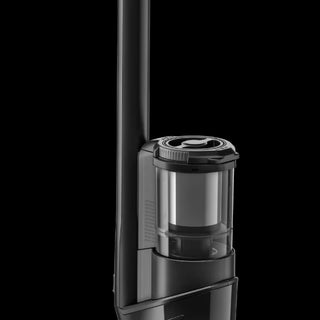 A close-up of the Miele Triflex HX3 Aqua Cordless Wet & Dry Vacuum in Obsidian Black by 2-Miele, featuring a transparent dust container, displayed against a black background.
