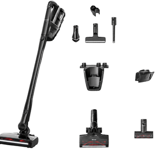 The Miele Triflex HX3 Cat & Dog Cordless Stick Vacuum in Obsidian Black by Miele features multiple interchangeable attachments and accessories displayed on a white background, delivering effortless cordless cleaning. With an advanced HEPA filter, this pet hair vacuum thoroughly removes dust and allergens for a fresher, cleaner home environment.
